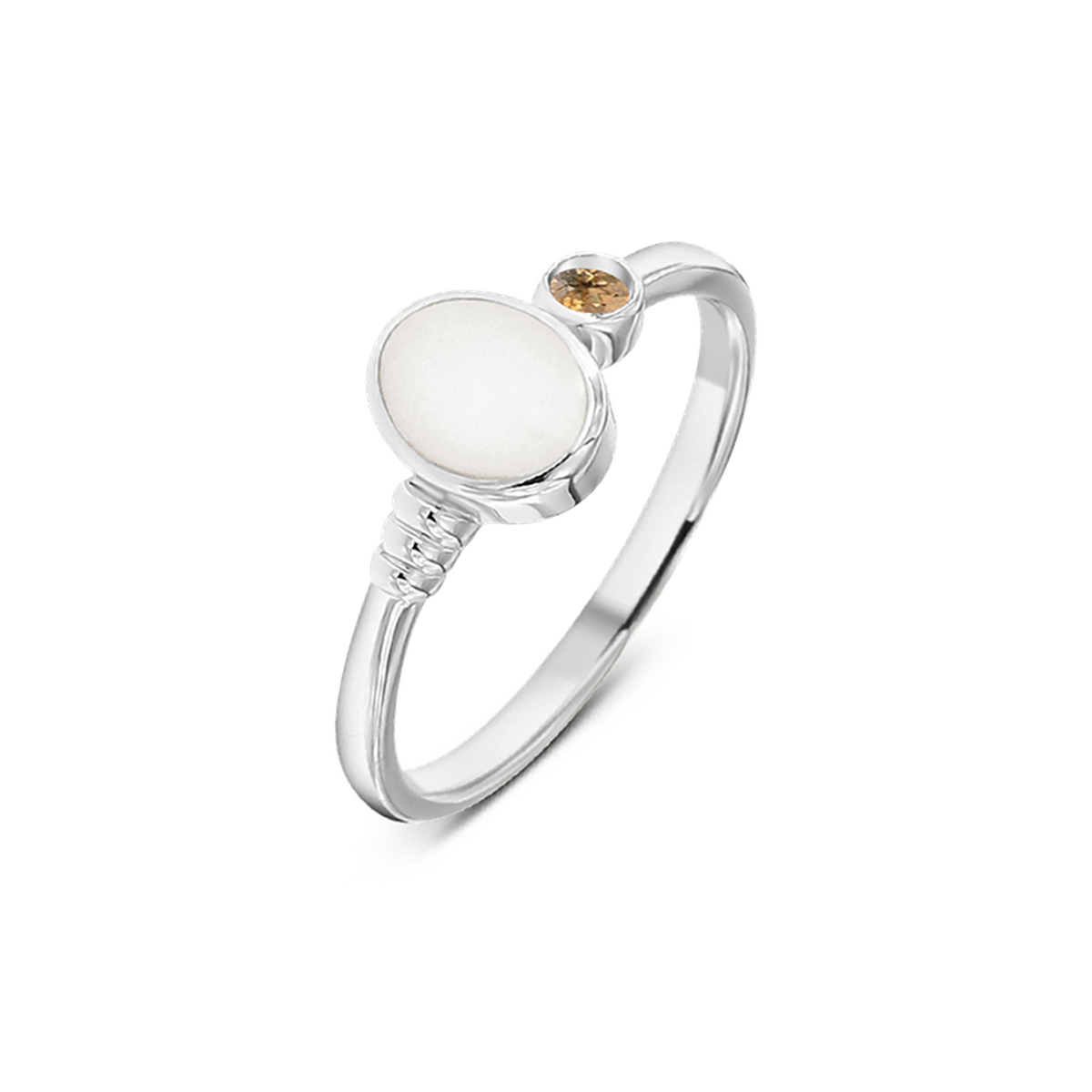 Silberner Ring mit runder Muttermilch-Kunstharz-Fläche und einem kleinen, goldenen Stein.